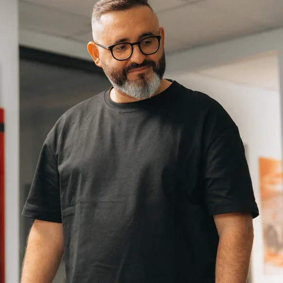A Setsail Web Developer smiling in the studio