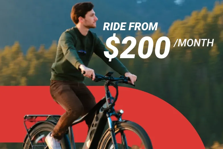 A DŌST e-bike ad Setsail made: a rider on the shore, “Ride from $200/month”