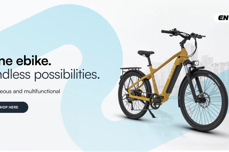 A yellow e-bike on an eBike BC banner
