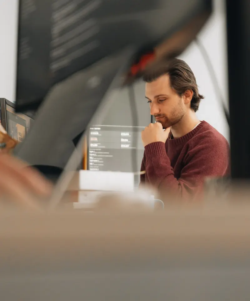 A Setsail Marketing strategist planning at a table in the studio