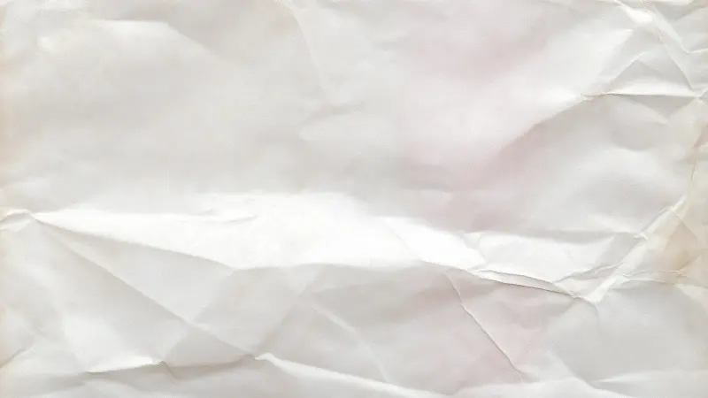 A crumpled sheet of white paper.