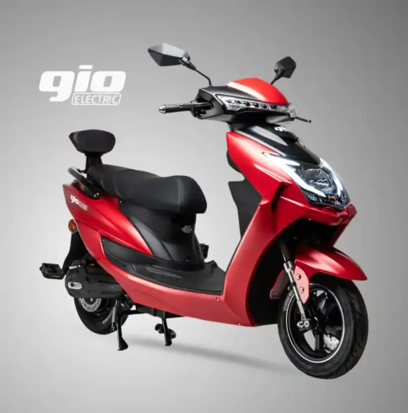GIO Electric red electric scooter product photo on a grey studio background with the GIO logo