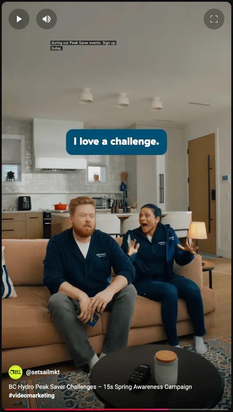 BC Hydro video still: a man and woman on a sofa, caption "I love a challenge." promoting Peak Saver events