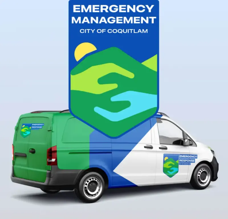 City of Coquitlam Emergency Management hexagon badge with clasped hands, shown large above a green, blue and white van