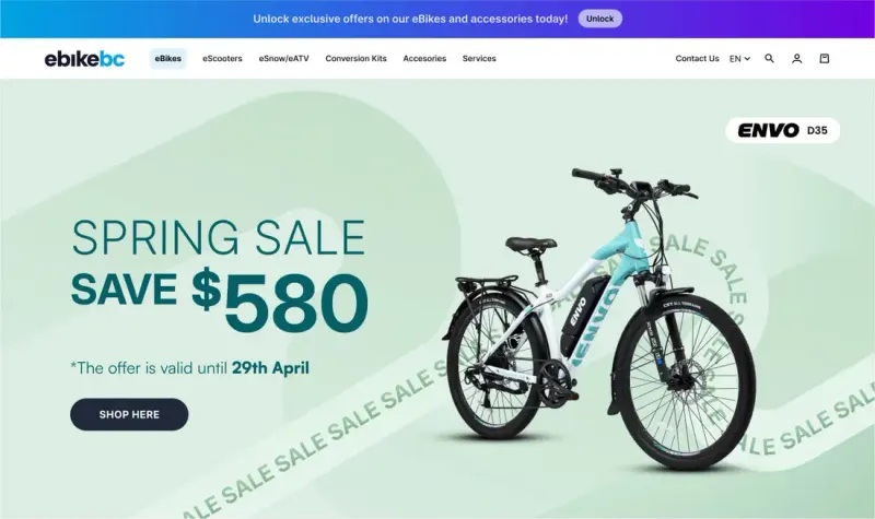 eBike BC Spring Sale hero banner 'Save $580' with an ENVO D35 e-bike and a Shop Here button