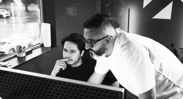 Two Setsail colleagues working together at a desk