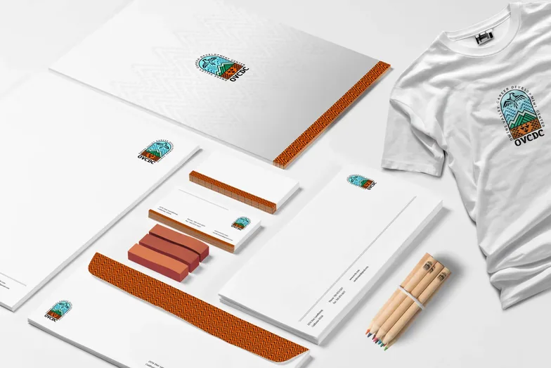 Owens Valley CDC stationery, pencils and a T-shirt carrying the new identity