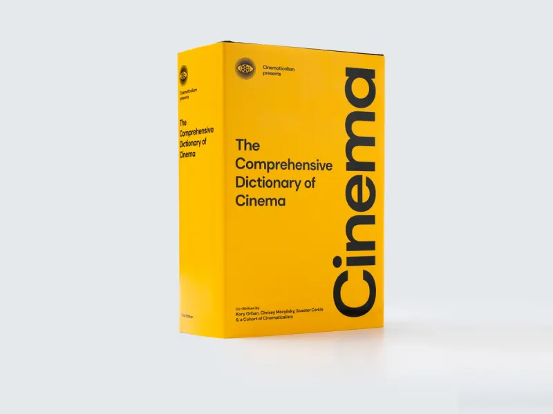 The Comprehensive Dictionary of Cinema standing in its yellow slipcase