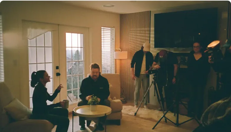 A Setsail crew filming an interview in a client's living room