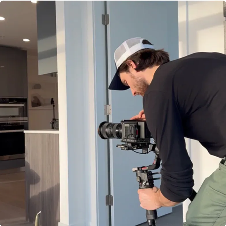 A Setsail producer filming with a camera on a gimbal