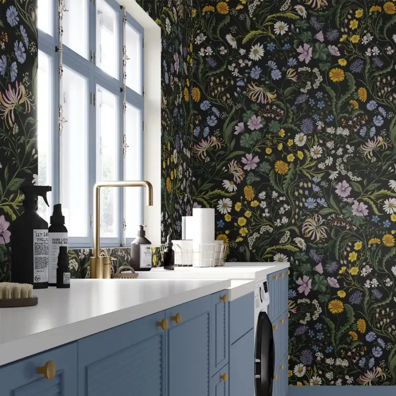 A laundry room papered in Lost Garden, in ebony