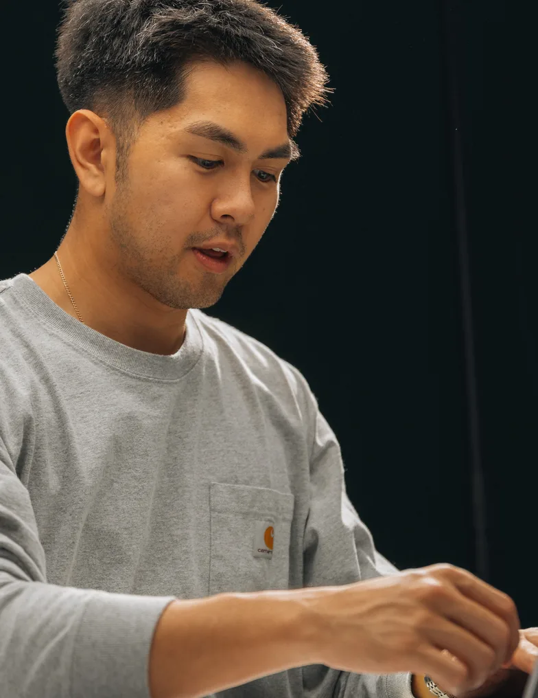 A team member focused on his work at the desk