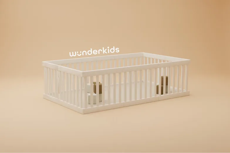 A white Wunderkids crib on a warm beige ground